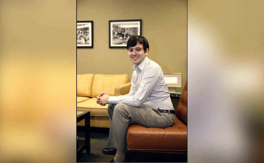 A young Martin Shkreli sitting on a couch. 