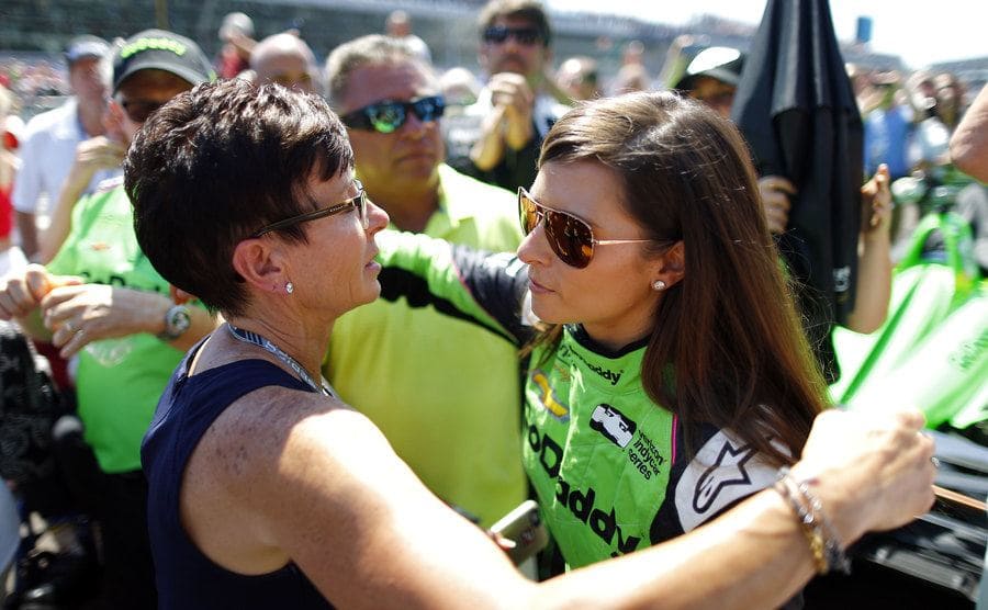 Danica Patrick hugging her mother before starting a race