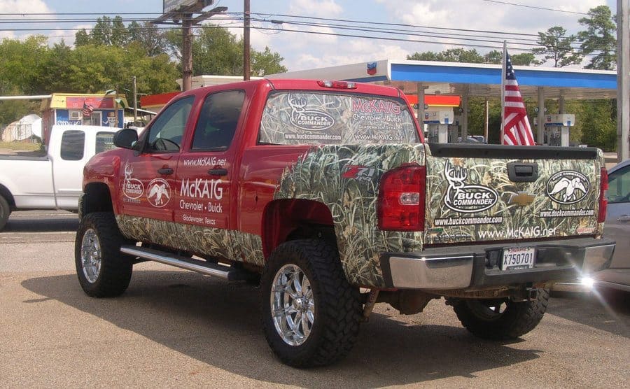 The truck Phil Robertson drives is covered with logos and stickers. 