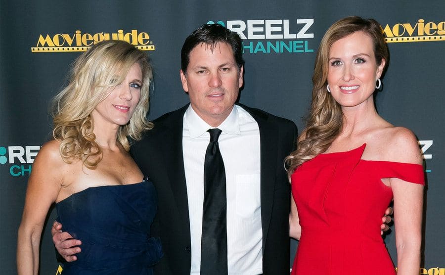 (L-R) Producers Deirdre Gurney and Scott Gurney, and TV personality Korie Robertson attend the 22nd Annual Movieguide Awards Gala.