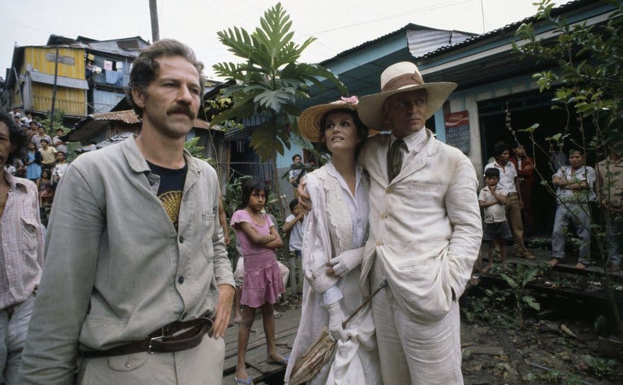 The set of Fitzcarraldo with the director and actors standing around 