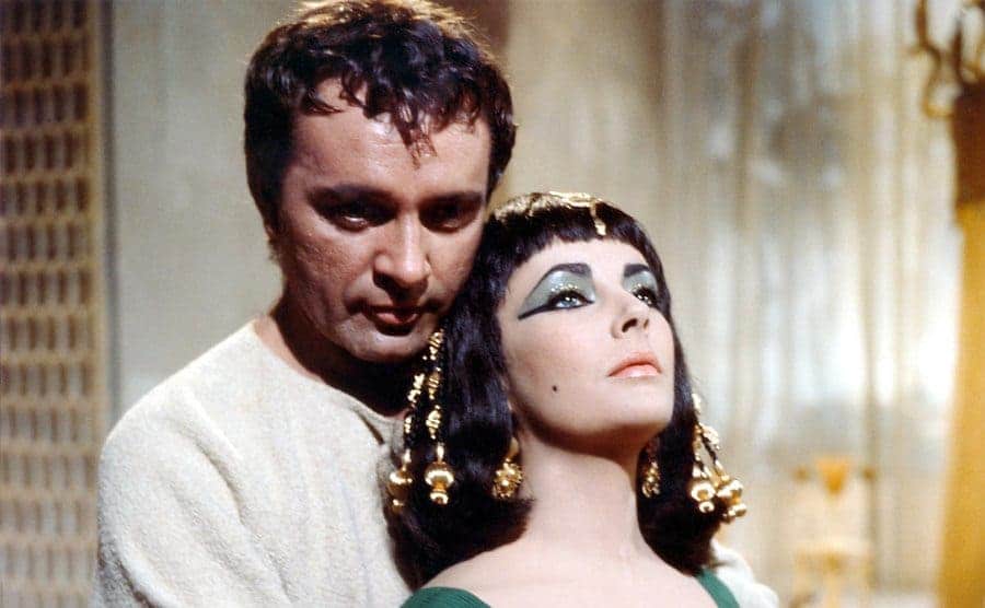 Richard Burton embracing Elizabeth Taylor in a scene from Cleopatra 