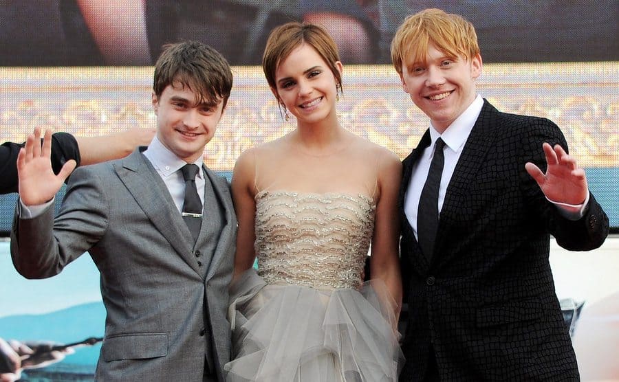 Daniel Radcliffe, Emma Watson, and Rupert Grint on the red carpet 