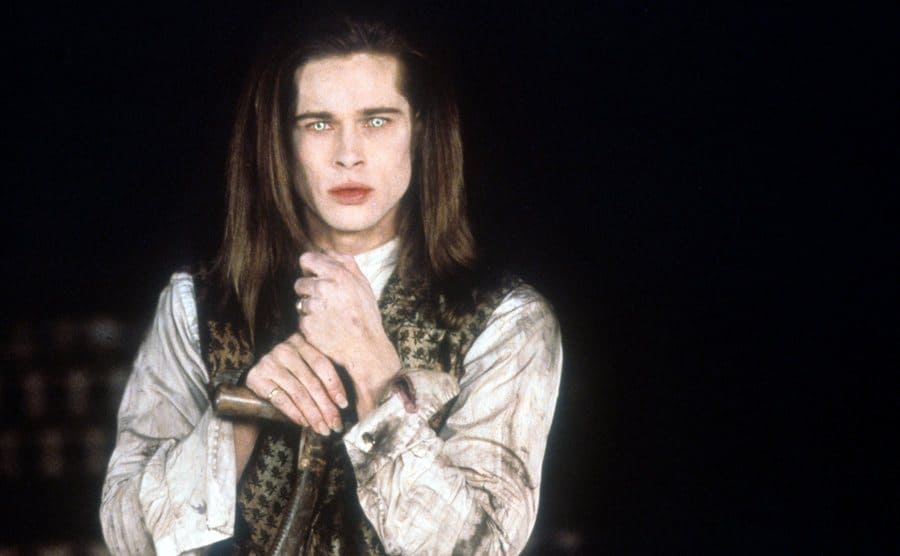 Brad Pitt with glowing eyes in a scene from Interview With The Vampire 