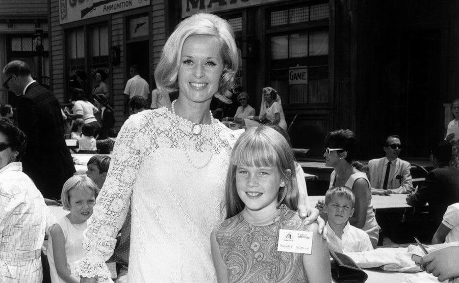 Tippi Hedren and Melanie Griffith posing together at a children’s party circa 1966