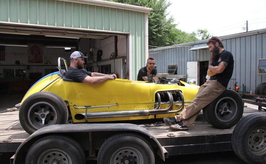 The crew of ‘Fast N’ Loud’ discussing a new car they found. 