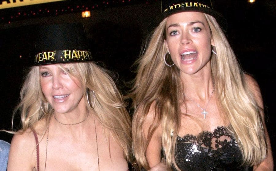Denise Richards and Heather Locklear are out celebrating New Year Eve. 