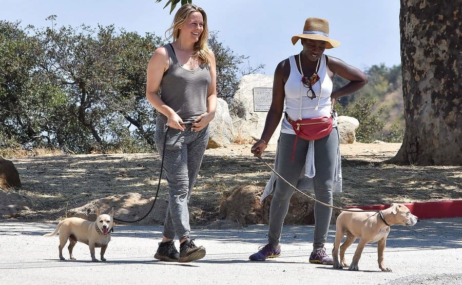 Alicia Silverstone is seen at the park walking her dog with a friend in Los Angeles circa 2020.