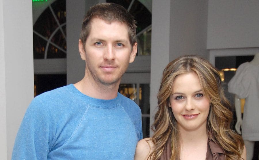Old photo from former couple Christopher Jarecki and Alicia Silverstone attending a Stella McCartney event. 