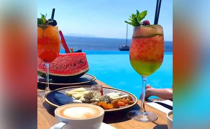 View of Emma Coronel's breakfast by the sea in Mykonos. 