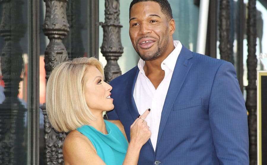 Kelly Ripa and Michael Strahan are attending a ceremony honoring Kelly Ripa with a Star on The Hollywood Walk of Fame, circa 2015.
