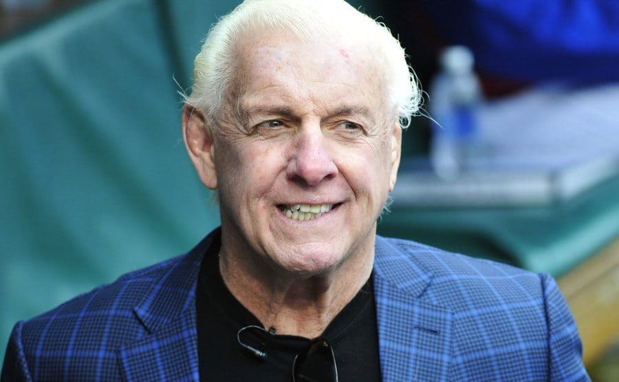 Close-up on Ric Flair getting ready to throw out the ceremonial first pitch before the game.