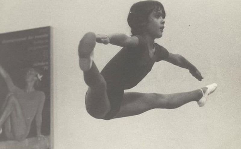 Young Salma Hayek is doing gymnastics. 