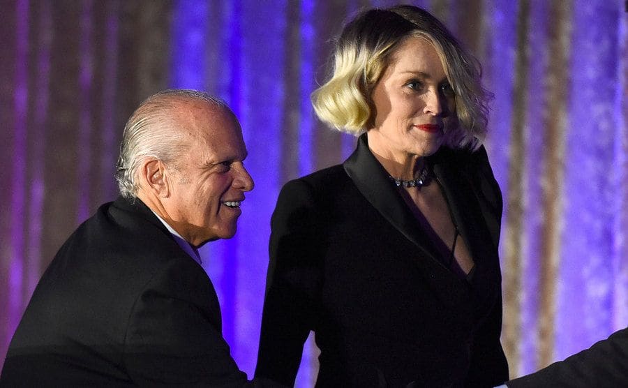 Sharon Stone and her manager, Chuck Binder, are attending the TMA 2016 Heller Awards.