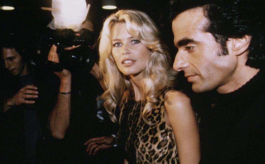 Paparrazi spots Claudia Schiffer and David Copperfield as they attend an event. 