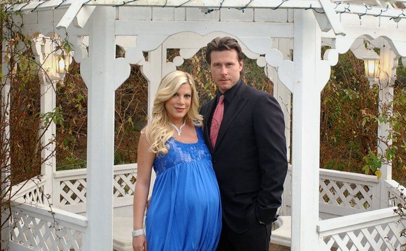 Tori Spelling and Dean McDermott pose at the Chateau La Rue. 