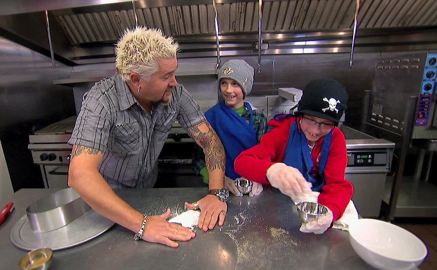 Guy Fieri is cooking with kids. 