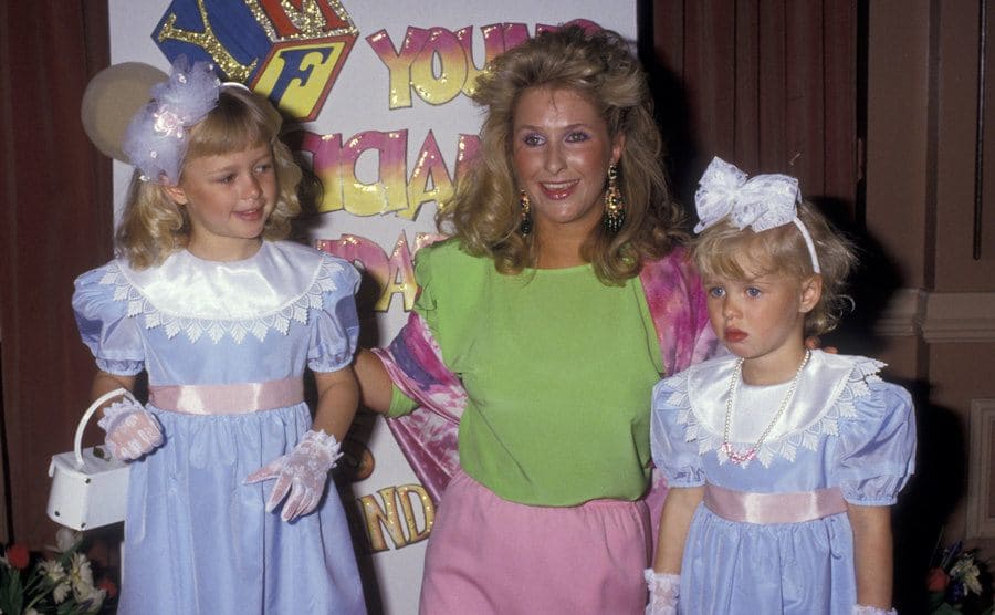 Paris Hilton, Kathy Hilton, and Nicky Hilton attend a Mother-Daughter Fashion Show. 