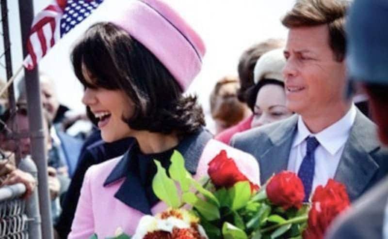 Katie Holmes and Greg Kinnear as Jackie and Jack Kennedy.