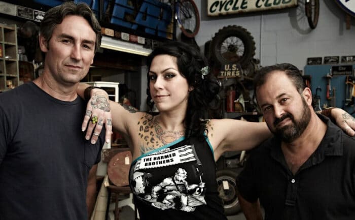 Mike, Frank, and Danielle Colby pose together 