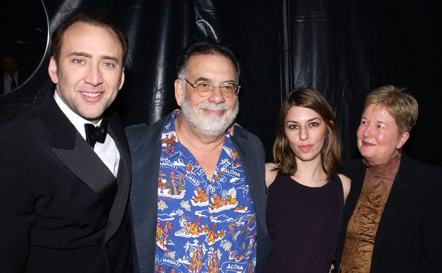 A picture of Nicolas Cage, Francis Ford Coppola, Sofia Coppola, and her mom.