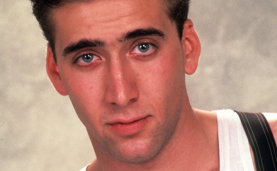 A portrait of a younger Nicolas Cage.