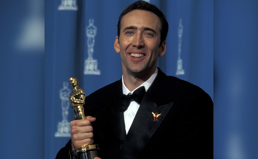 Nicolas Cage poses backstage to the Academy Awards. 