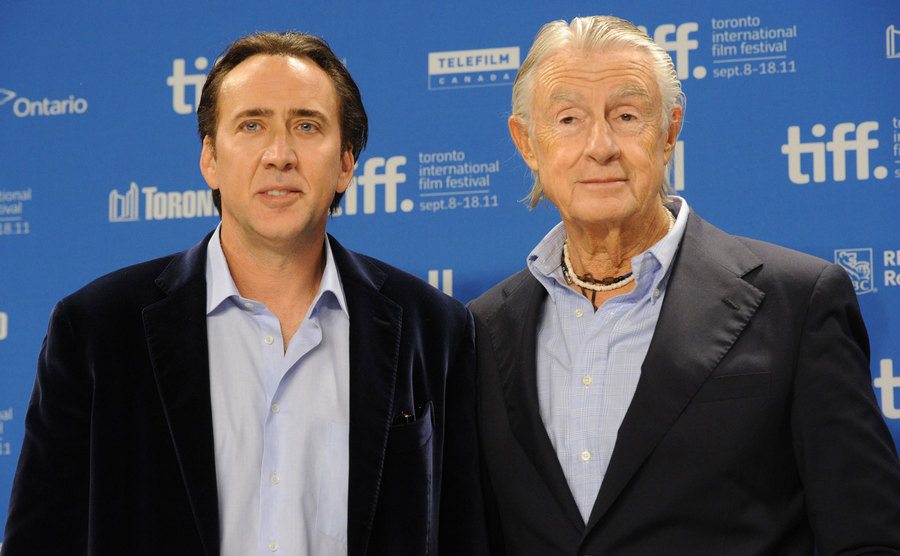 Nicolas Cage and Joel Schumacher pose for the press.