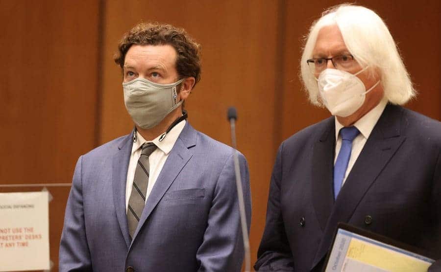 Danny Masterson stands in court with his lawyer.