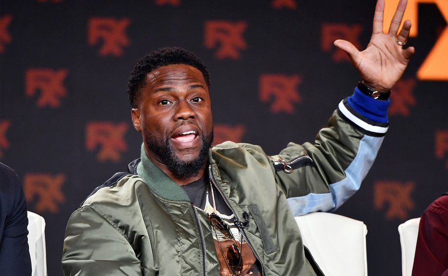 Kevin Hart speaks during a talk show. 