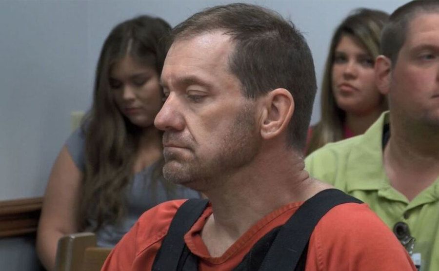 A picture of Daniel Myers sitting in court.