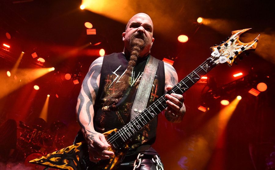 Kerry King of Slayer playing the guitar on stage. 