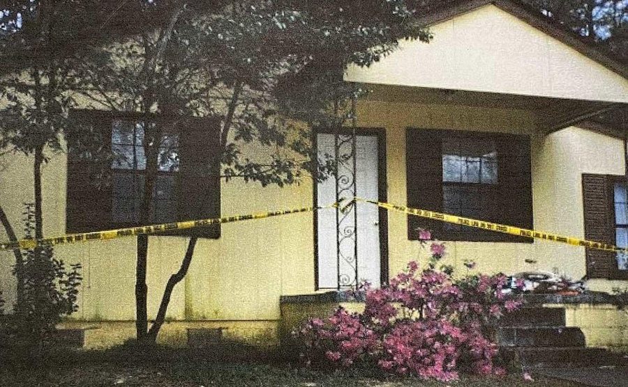 Tracey Harris’s home is surrounded by crime scene tape.