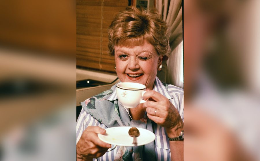 Angela Lansbury enjoys a cup of tea. 