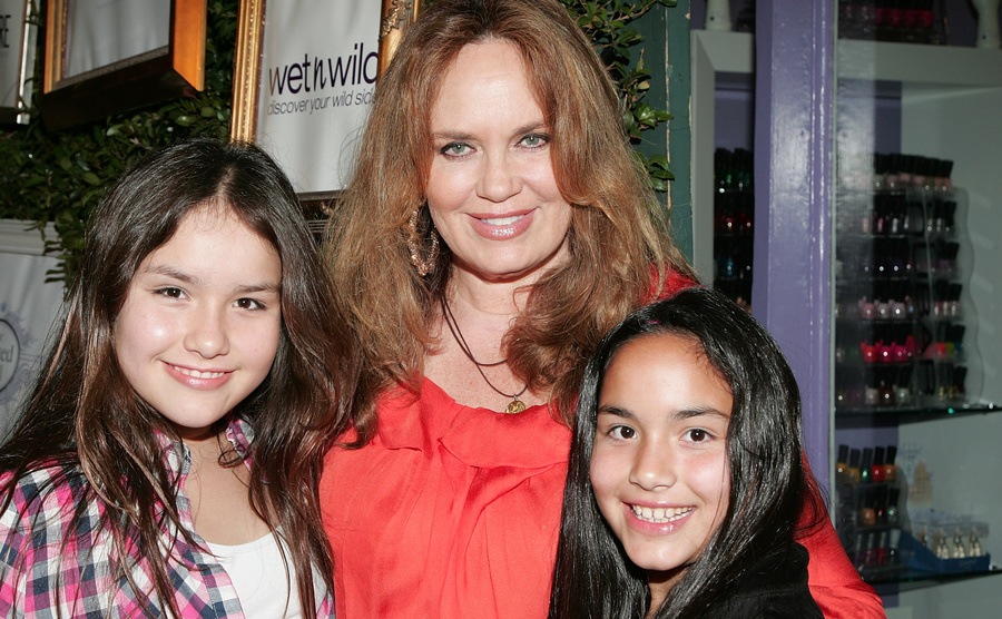 Catherine Bach and daughters pose together. 
