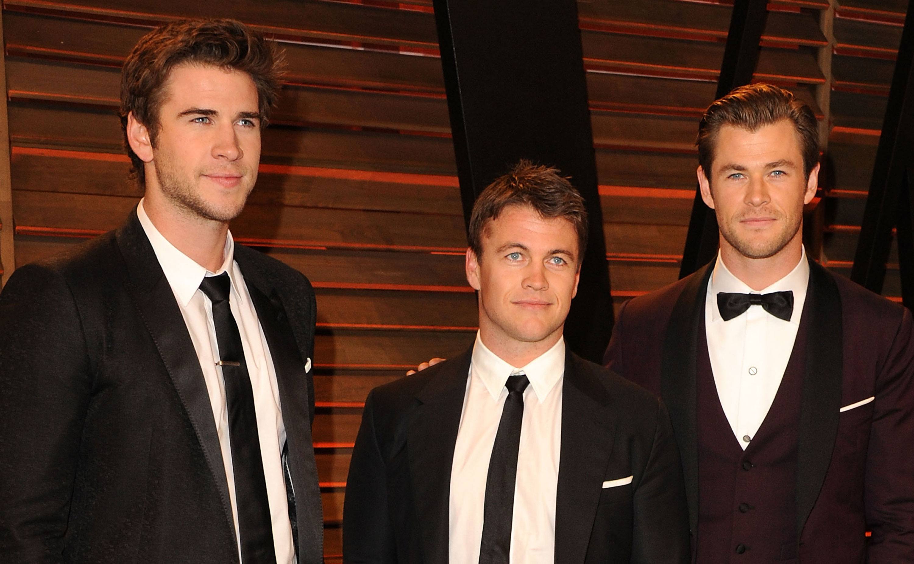 Liam, Luke, and Chris attend an event.