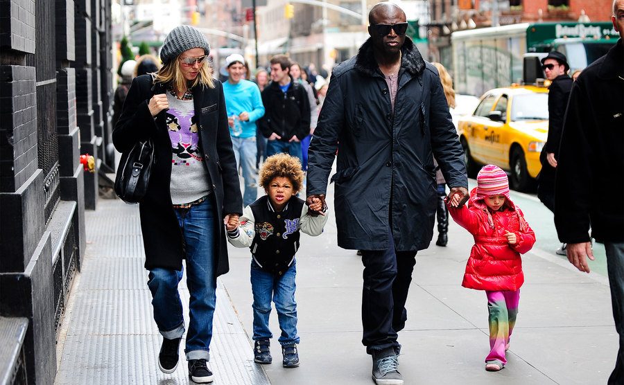 Heidi Klum, son Henry Samuel, Seal, and daughter Leni Klum walk down the street. 