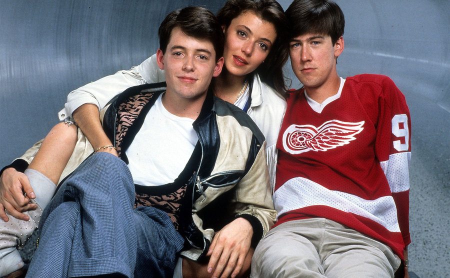 Matthew Broderick, Mia Sara, and Alan Ruck pose for a portrait. 