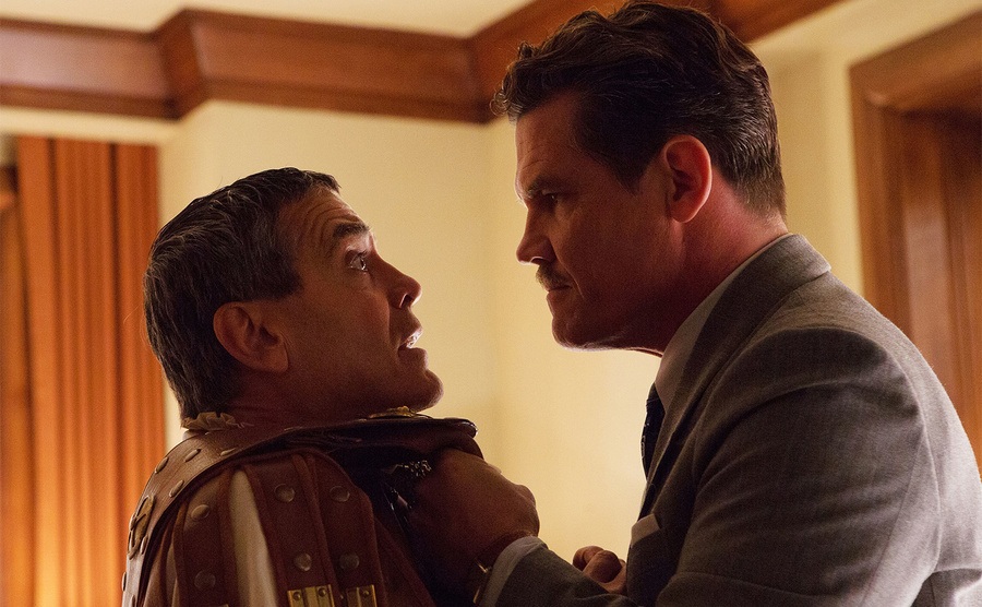 George Clooney gets manhandled by Josh Brolin in a still from the film. 