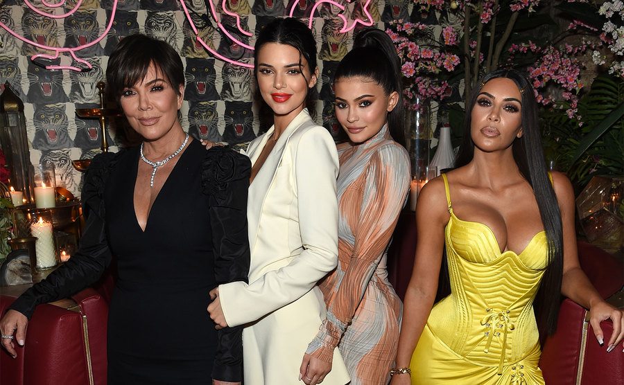 Kris Jenner, Kendall Jenner, Kylie Jenner, and Kim Kardashian during an event. 