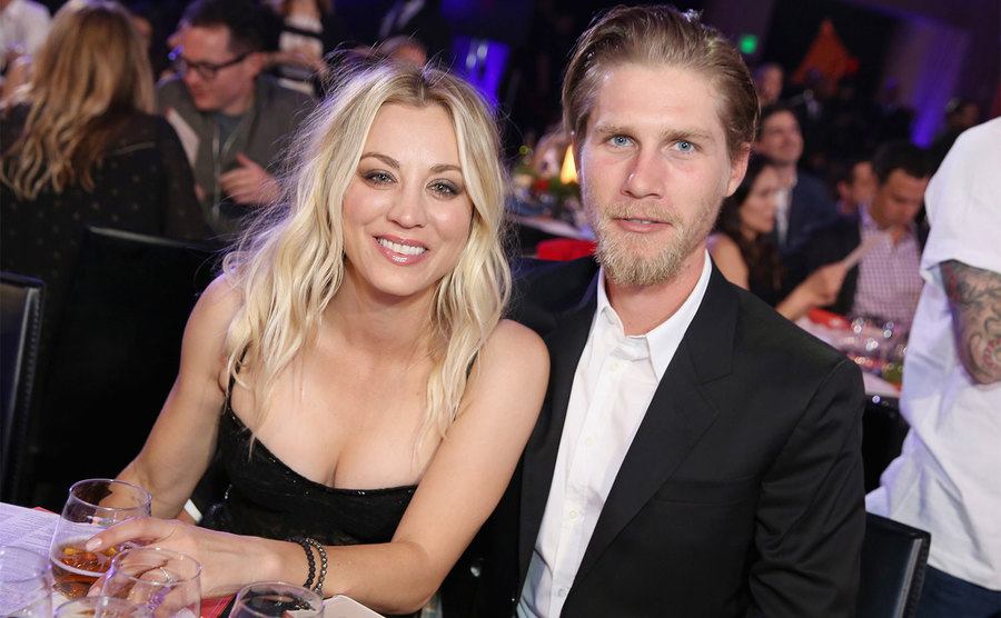 Kaley Cuoco and Karl Cook attend an event. 