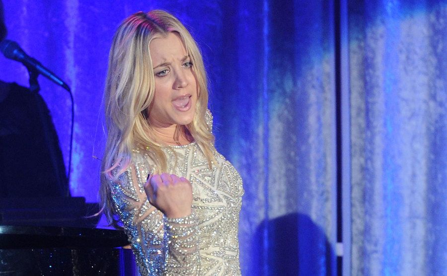 Kaley Cuoco performs onstage during a fundraiser. 
