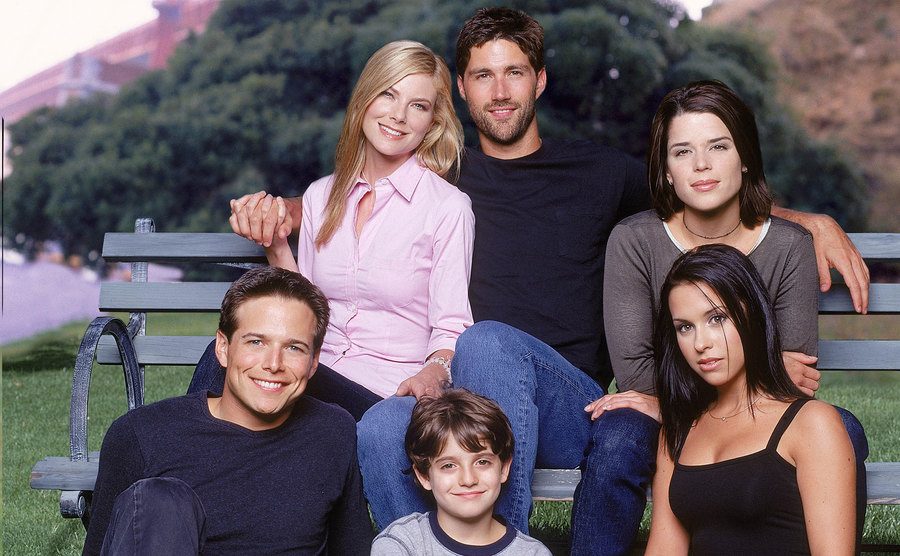 The Party of Five cast poses with Jacob Smith. 