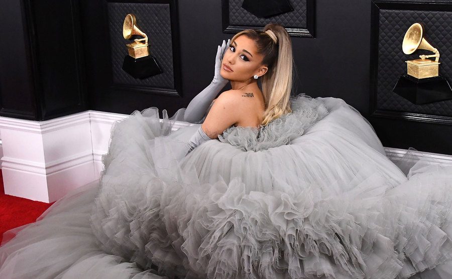 Ariana Grande poses for the press.