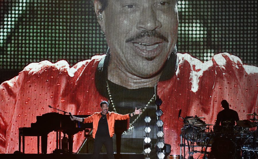Lionel Richie performs on stage.