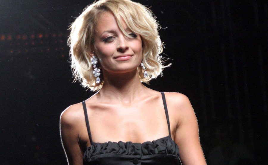 A photo of Nicole Richie during a fashion show.