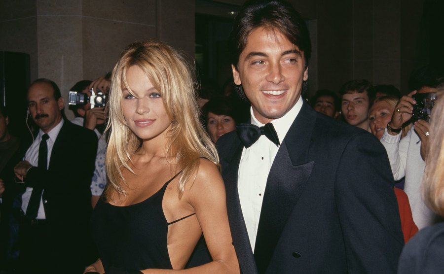 Scott Baio and Pamela Anderson attend an event.