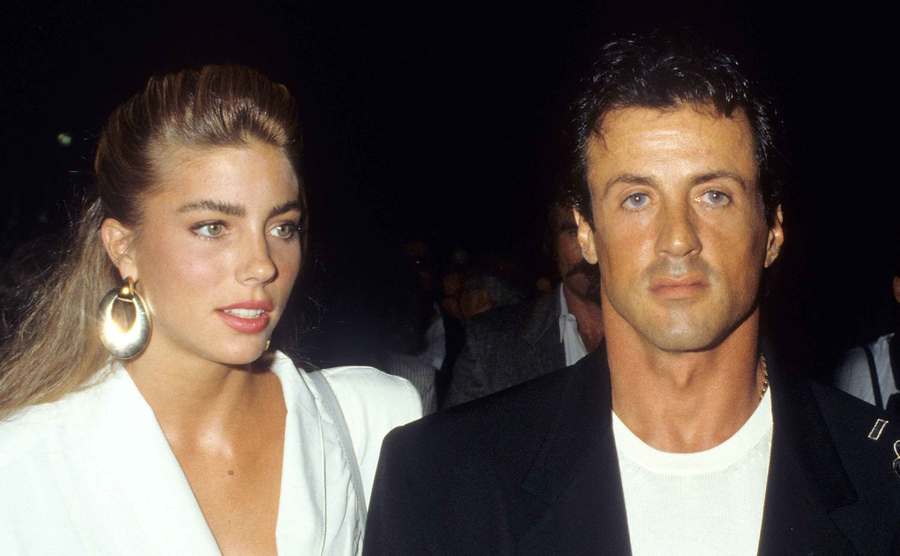 Jennifer Flavin and Stallone attend an event.
