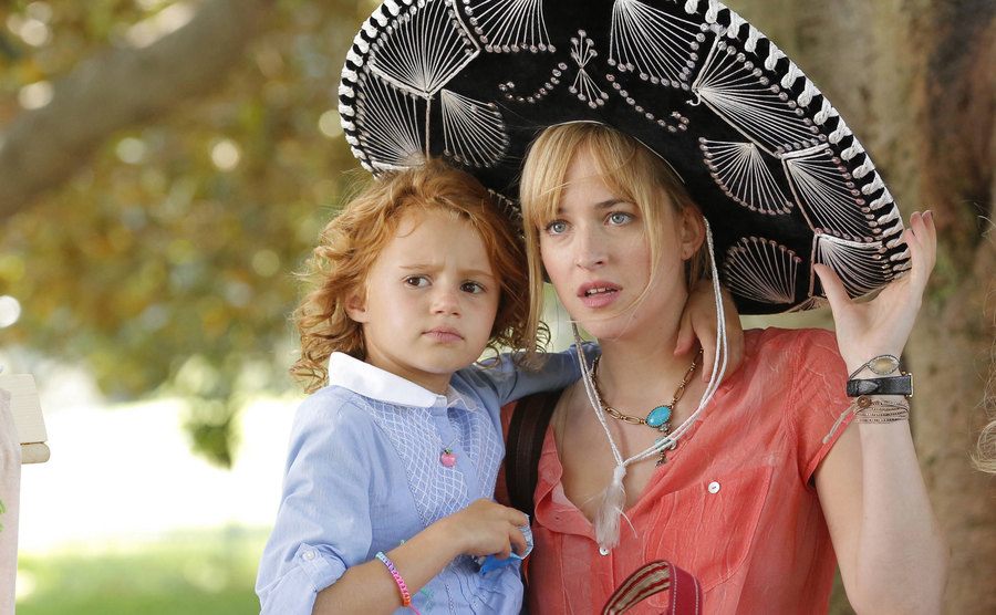Dakota Johnson is in a still from the television show.