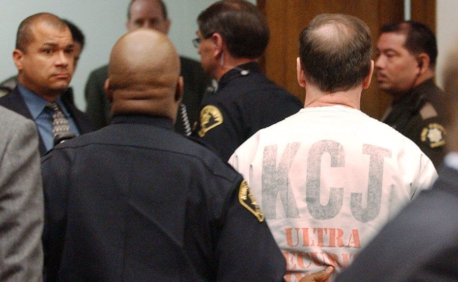 Gary Ridgway is taken away from the courtroom.